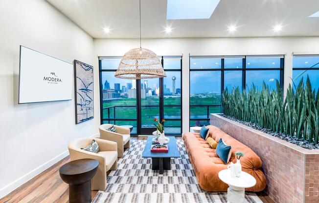 Lounge in style with skyline views—your rooftop escape at Modera Trinity awaits.