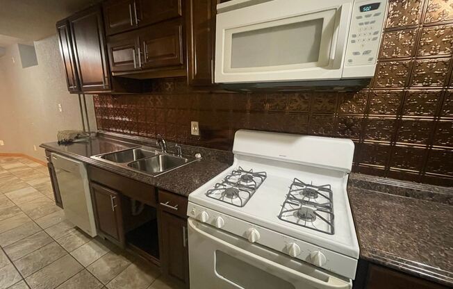 June 2023 ~ Cute 4 bedroom house. Spacious bedrooms. In unit laundry and dishwasher.