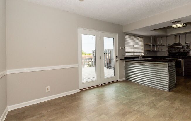 3 bed, 2.5 bath Townhome, Amazing New Deck, Covered Parking-Available Now