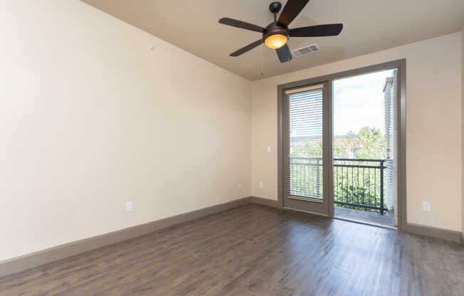 Living Room with Balcony and Hard Surface Flooring