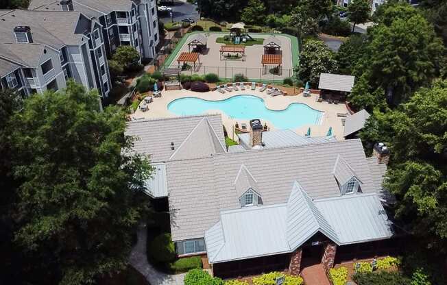 arial view of a house with a swimming pool