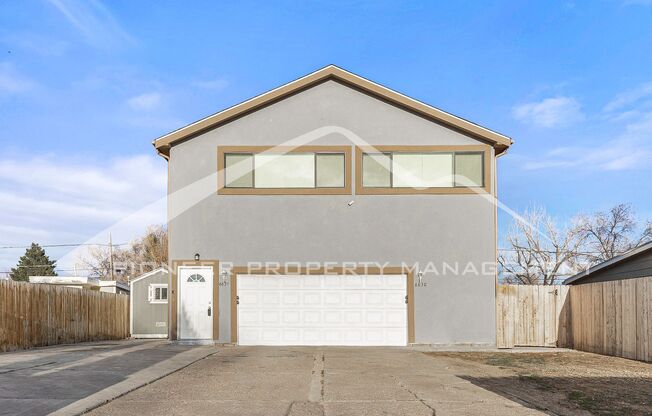 Lower Level Half Duplex with Two Car Garage and Fenced Yard