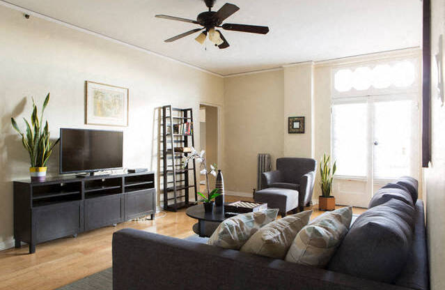 living room with ceiling fan