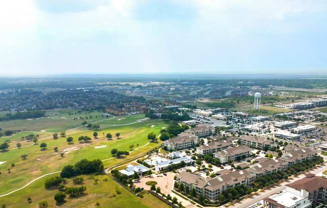 arial view of the campus with the water tower in the distance