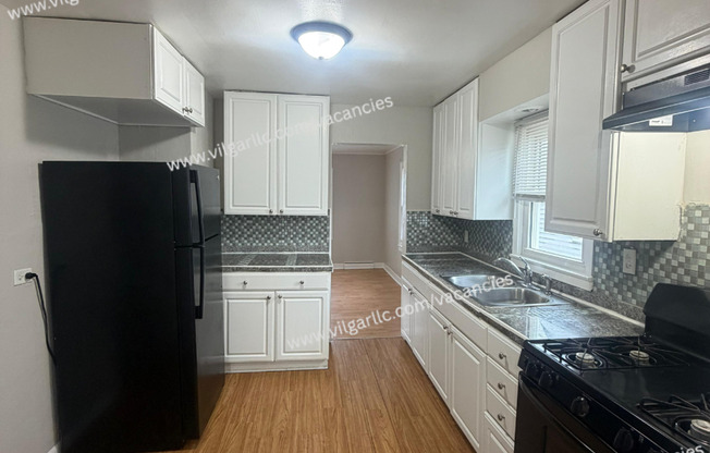 4 Bedroom • 2 Full Bath • 2-Car Garage • Fenced in Yard • Bonus Rooms • Appliances present