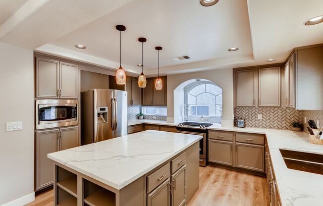 Modern 5-Bedroom, 3-Bathroom Oasis with a 3-Car Garage in the Heart of Las Vegas
