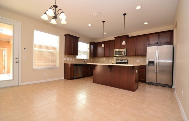Gorgeous Lake View 3 BR 2.5 bath Luxury Townhome in Windermere Trails – Highly Upgraded and close to everything