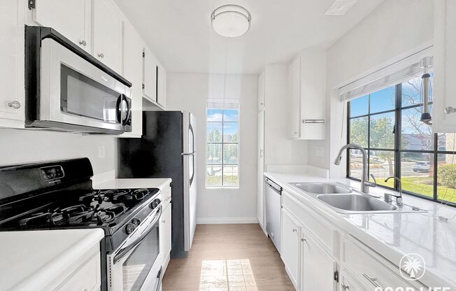 First-Floor Mira Mesa Condo with Patio & Ensuite Bedrooms