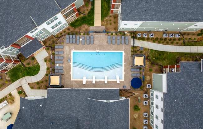 arial view of a swimming pool in the middle of a building