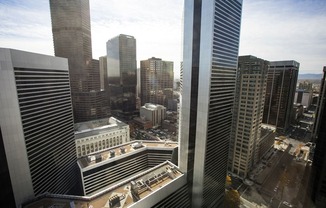 a view of the city from a skyscraper at Apartments at Denver Place, Denver