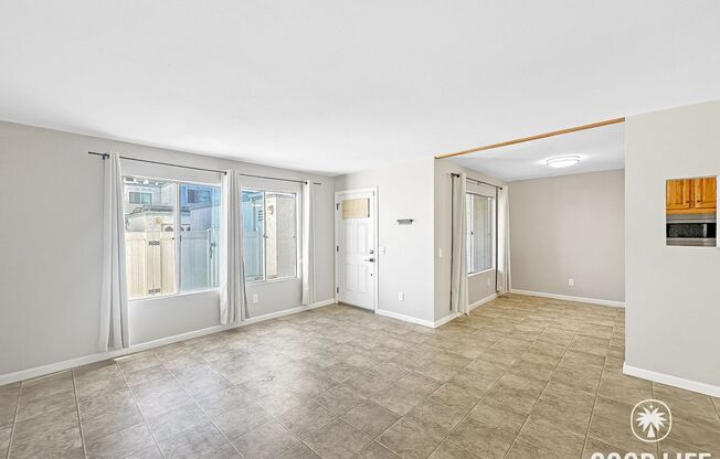Spacious 3BD/2.5BA Two-Story Condo in Southwest Chula Vista with Kitchen Island, In-Unit Laundry & 2-Car Garage
