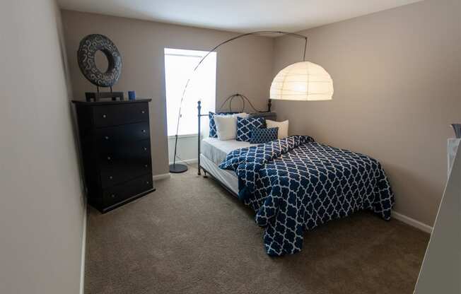 This is a picture of the second bedroom in an upgraded 980 square foot, 2 bedroom, 1 bath model apartment at Fairfield Pointe Apartments in Fairfield, Ohio.