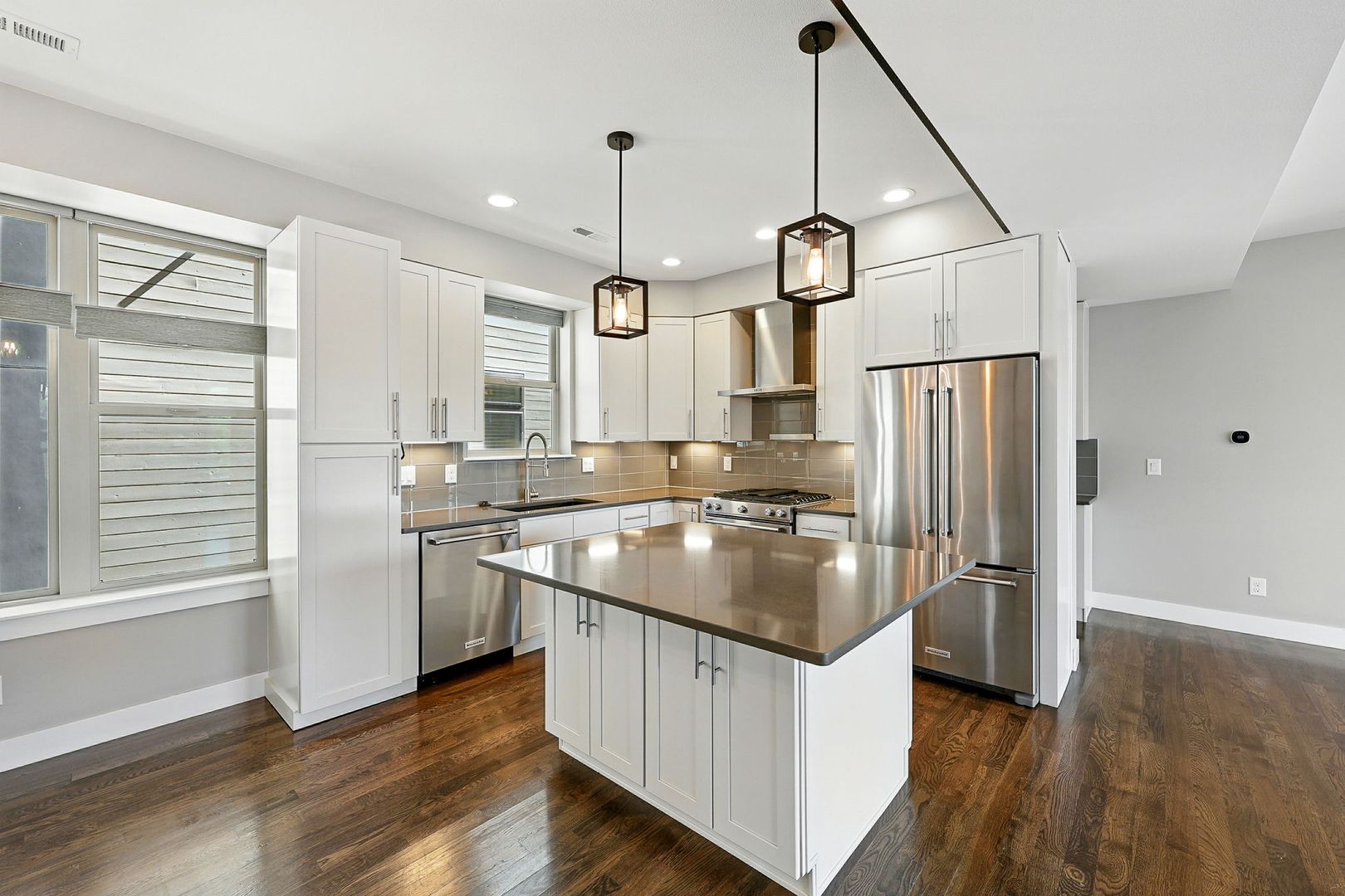 Modern 3-story Townhome | Rooftop Deck + Garage | Prime Old Town Littleton
