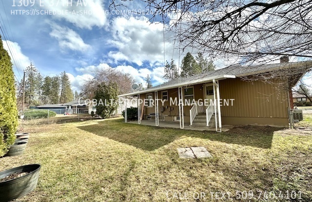 1309 E 37 AVE