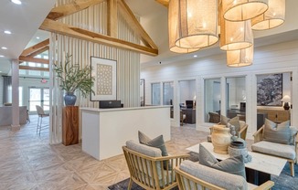 the lobby at the heights at harper's preserve apartments in conroe, tx