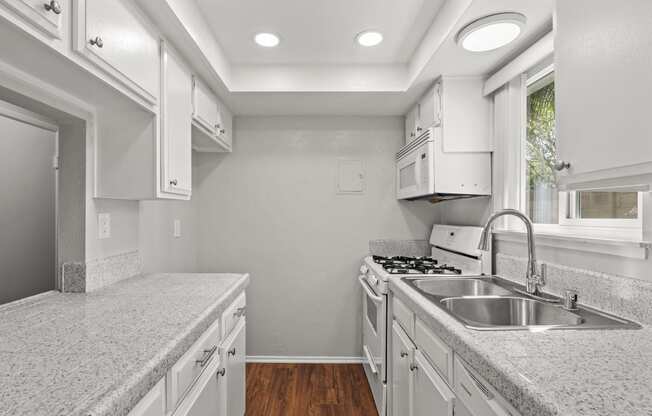 Upgraded Kitchen with White Cabinets