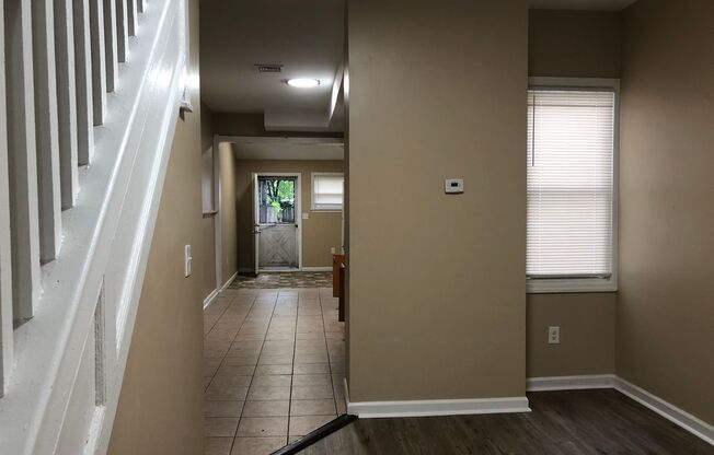 Great Home! 4 Bedrooms! Lots of Living Space! Updated Kitchen with Granite Counters! New Wood Flooring!