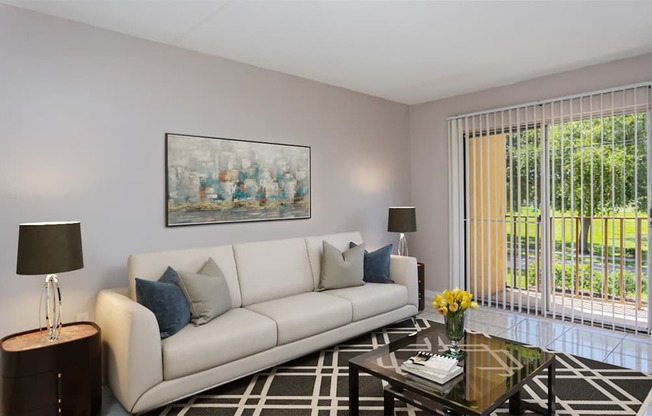 a living room with a couch and a coffee table