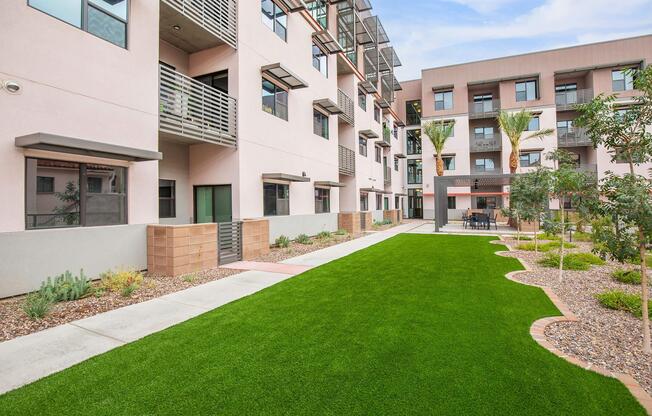 a large lawn in front of a building