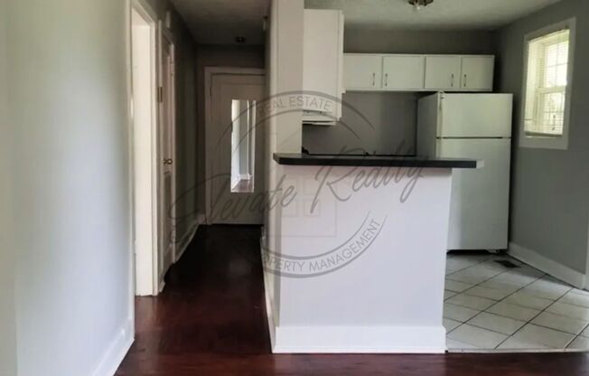 HOT LISTING in Edgehill Neighborhood! TWO Bedroom, one bath, Flex Space with a deck, on the FIRST floor!