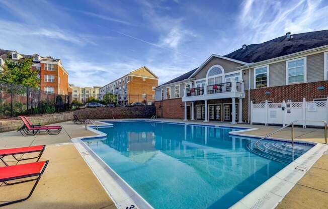 our apartments have a large pool with a blue sky above it at MetroPlace at Town Center, Maryland, 20746