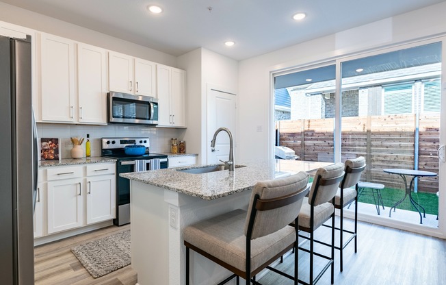 Embrace the modern convenience of a single-basin sink paired with a sleek pull-down faucet.