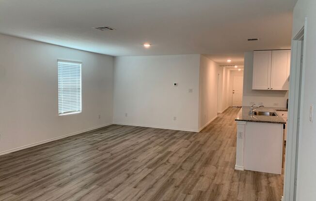 Luxury Vinyl Plank (No Carpet) / Fridge Included  /Granite Countertops Throughout / Instant Hot Water / CISD