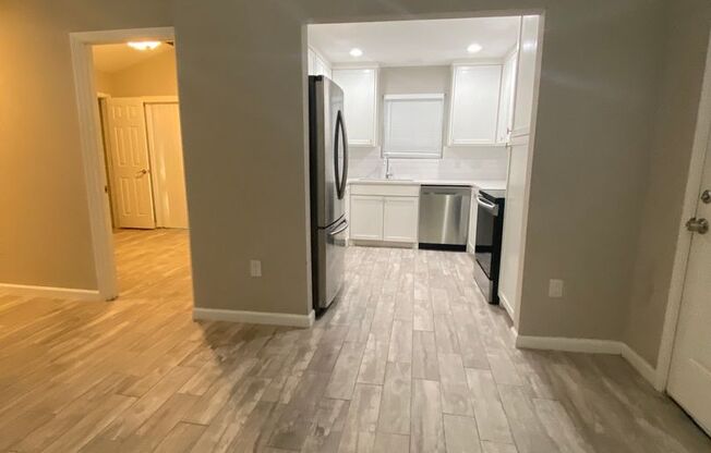 Large new in 2022 home with 2 car garage, fenced year and open spaces.