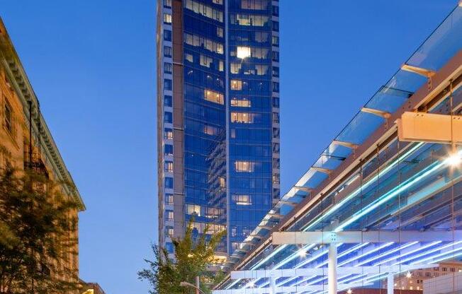 A tall building with a blue sky in the background.