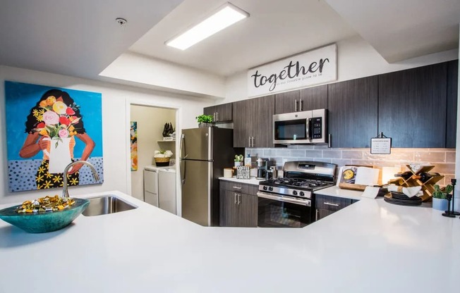 A kitchen with a bowl of food on the counter.