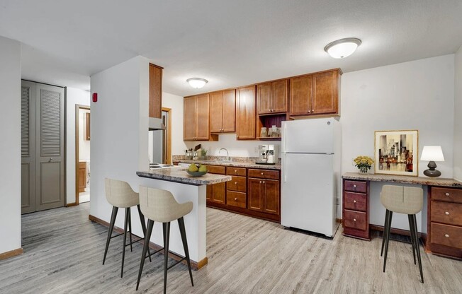 Welcome to Central Lakes of Uptown, where modern living meets comfort. This stylish kitchen features sleek cabinetry, updated appliances, and a cozy dining area. Elevate your lifestyle today! Schedule a tour to see your new home!