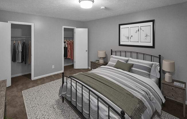 a bedroom with a bed and two closets