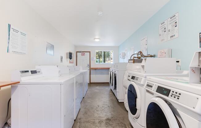 a washer and dryer are available in the laundry room