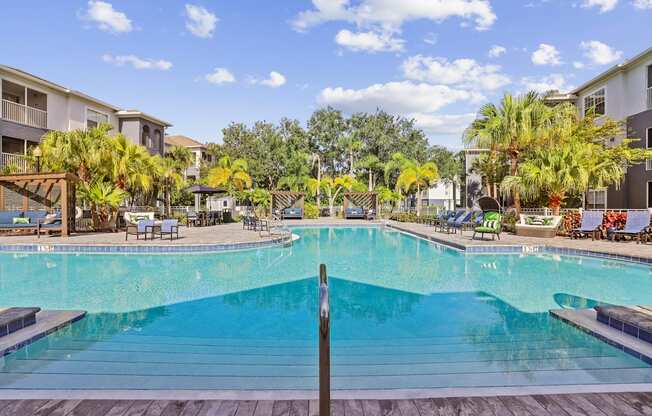 a swimming pool at the resort on a sunny day