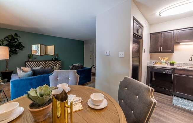 At Ashton Brook Apartments, the dining room is open to the living room and has easy access to the kitchen