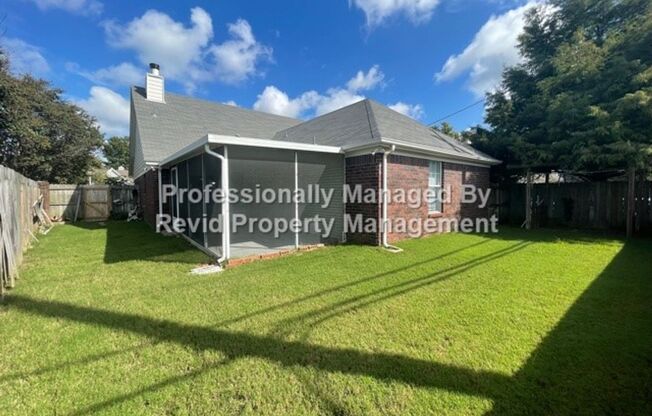 Wonderful 3 Bed 2 Bath Home with Screened in Porch and 2 Car Garage!