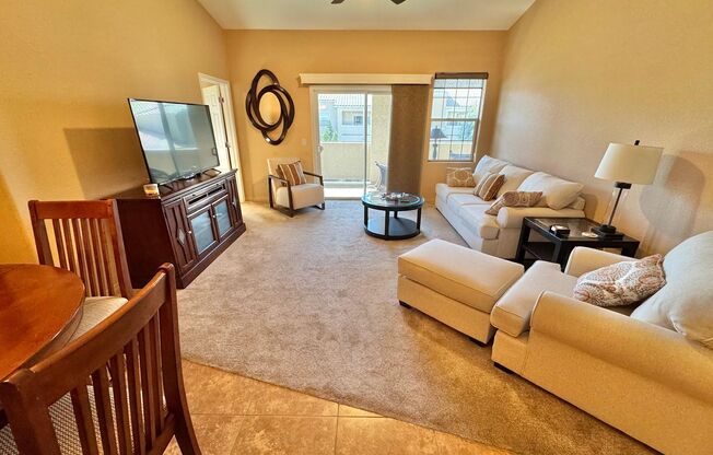DISCOVER CONTEMPORARY LIVING IN THIS STYLISH TOP-FLOOR 2-BEDROOM, 2-BATHROOM CONDO LOCATED IN THE HIGHLY DESIRABLE SOUTHWEST LAS VEGAS AREA.