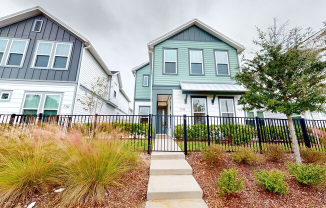 Extraordinary single-family Courtyard Home nestled within David Weekley's exclusive enclave of Tidal Pointe!