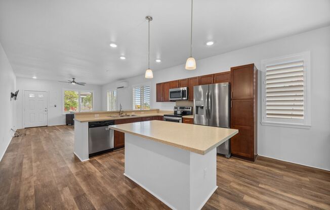 Flexible 6-Month Lease--Solar-Powered Wailuku Home with Ocean views, Fruit Trees, Split AC & Dog-Friendly!