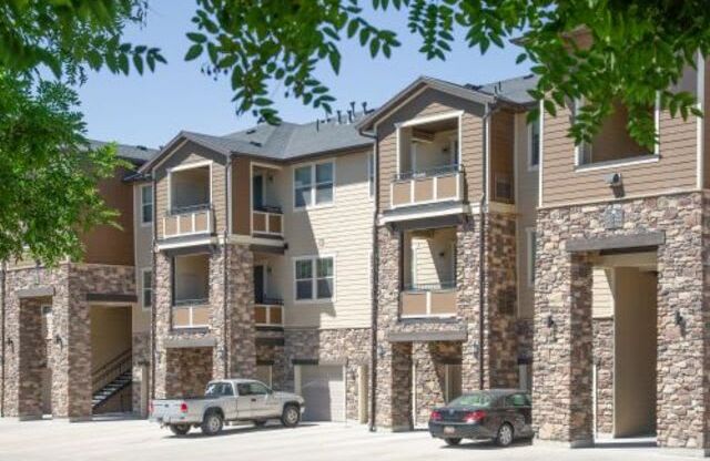Exterior View with Attached Garages at San Tropez Apartments & Townhomes, South Jordan