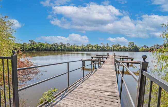 Pond dock with trees in the background at Ultris Island Park in Shreveport, LA
