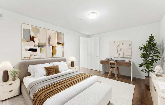 A bedroom with a large bed and a mirrored wall.