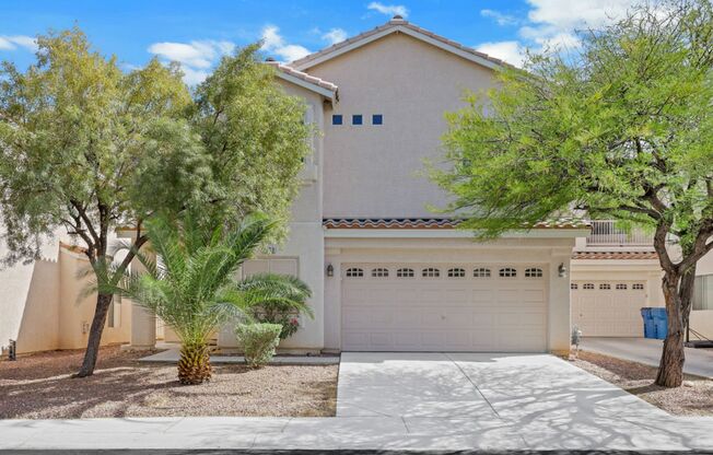 Gorgeous home with new flooring throughout and a Community Pool!