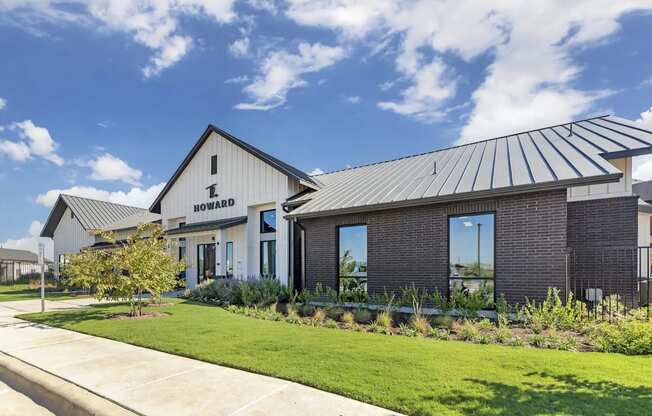 A modern building with a sign that reads "L Howard Howard".