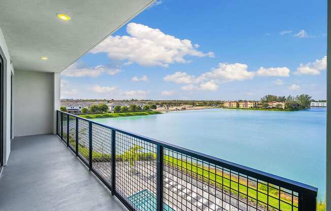 The view from the balcony of a condo overlooking the water