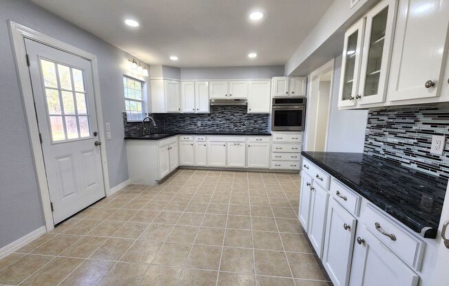 218 W Williamson Ave in Harlingen! 3BD/2.5BTH HOME WITH POOL! Pool maintenance included!