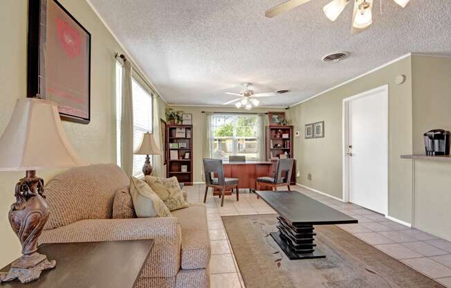 a living room with a couch and a coffee table
