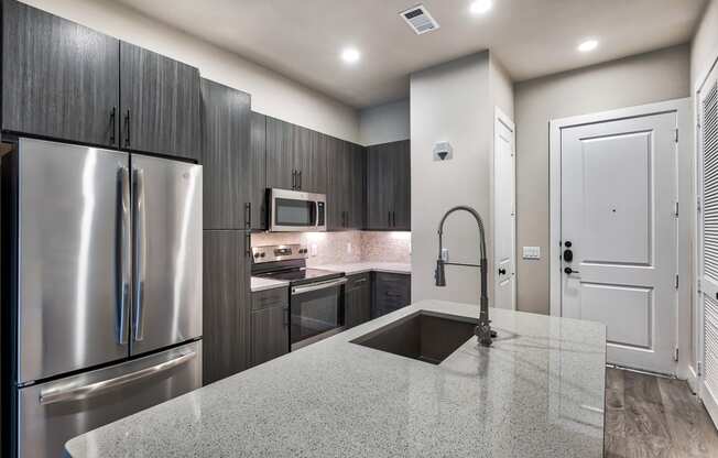 Gourmet Kitchens with Stainless Steel Appliances at Windsor Burnet, 10301 Burnet Rd, TX