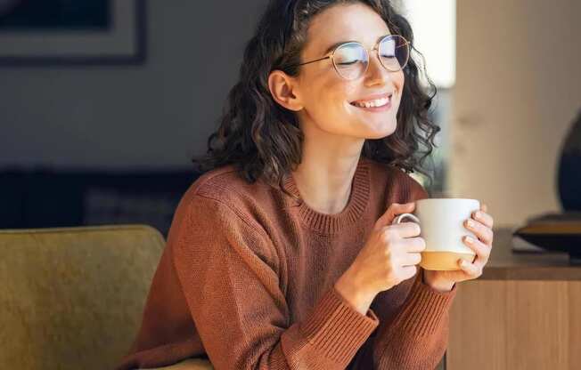 Woman Smiling Sitting Inside