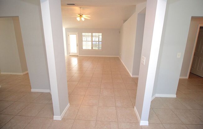 Spacious 4 Bed 2 Bath Screened Lanai Home w Fenced Yard in R Section!